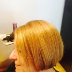 woman from left side with full hair from evolve treatment