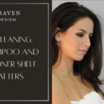 A woman examines a shampoo bottle, next to a sign reading "Spring Cleaning: Why Shampoo and Conditioner Shelf Life Matters" from Jyl Craven Hair Design.