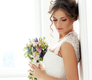 Bride posing with an updo