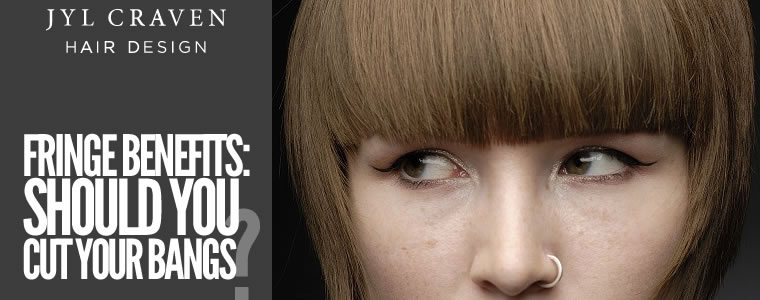 Close up of woman with fringe across forehead for article on if you should trim bangs