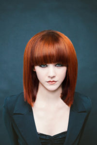 a redheaded model for jyl craven hair design